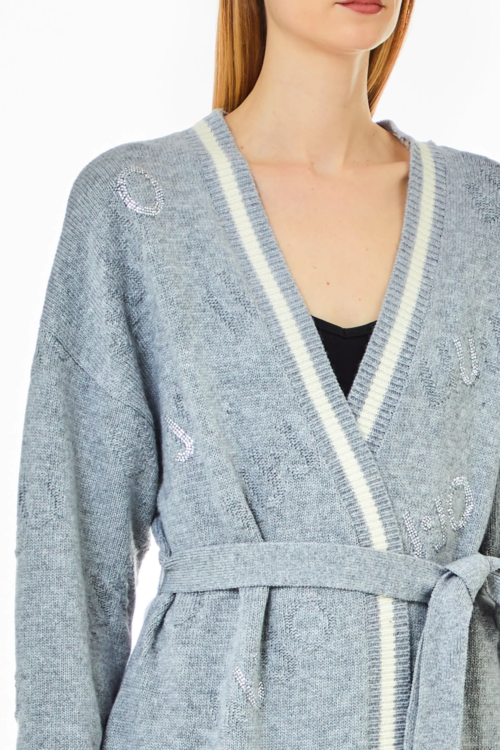 cardigan_lungo_con_cintur_1.webp New Cardigan lungo con cintura e motivo jacquard di Donna Giacche