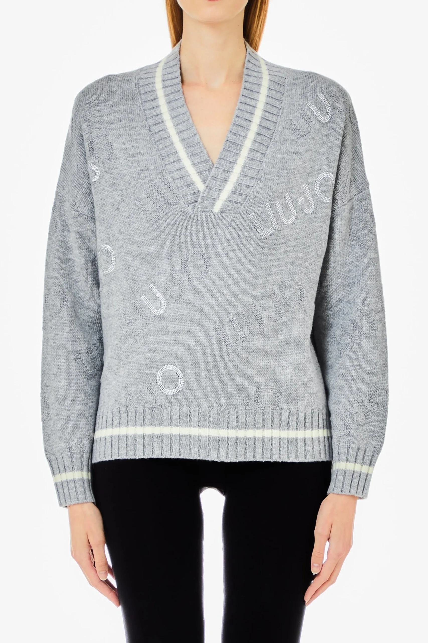maglia_con_scollo_a_v_e_m_0.webp New Maglia con scollo a V e motivo jacquard di Donna Felpe